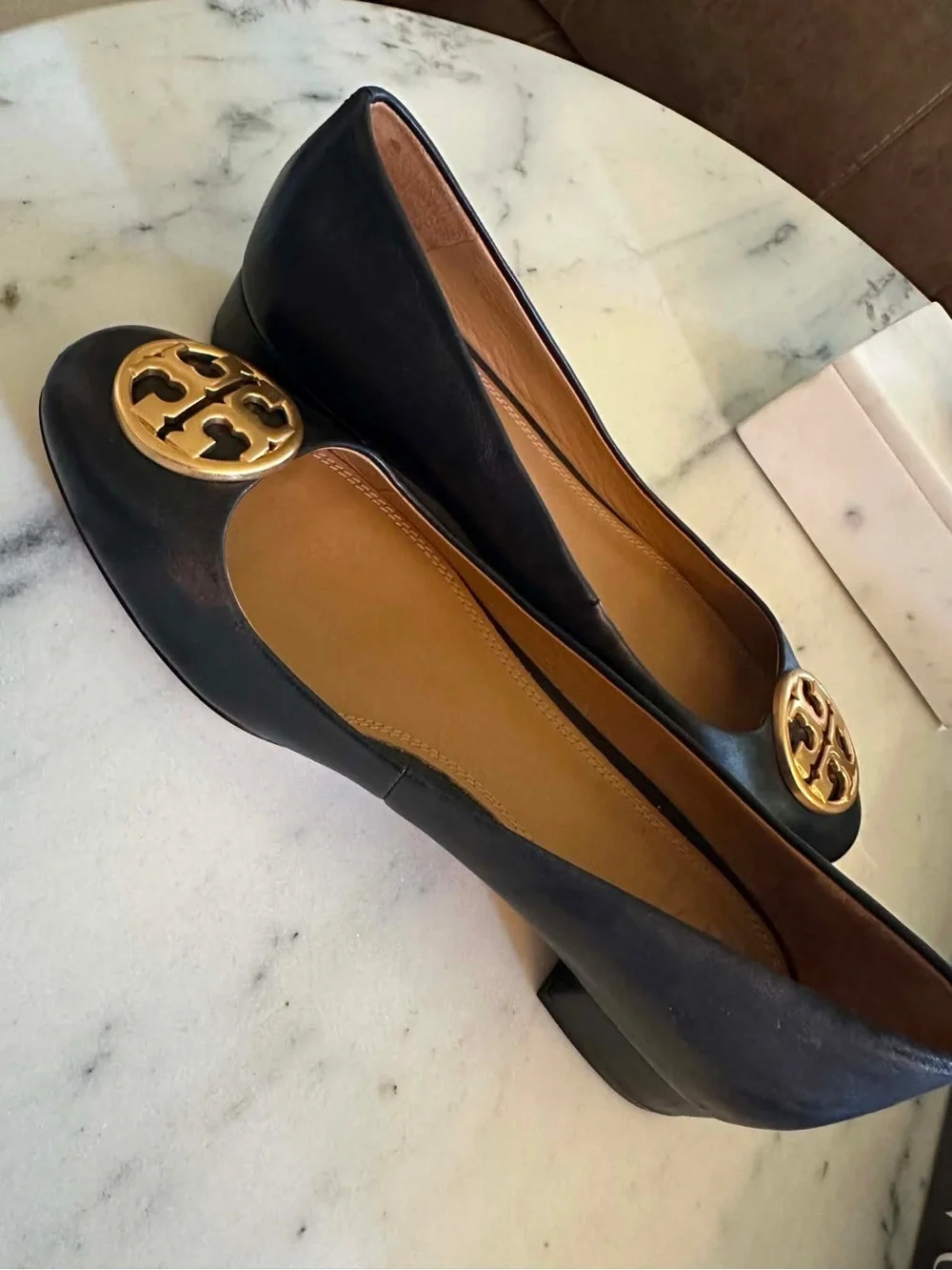 Tory Burch Black Leather Flats with Gold Logo  Contact me at: 985-758-9360